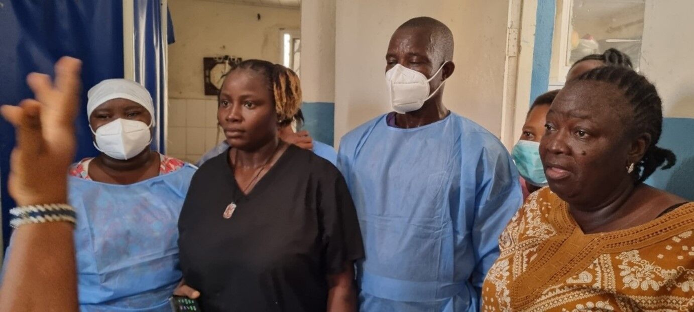 Health care workers participate in a patient simulation simulation exercise in Sierra Leone.